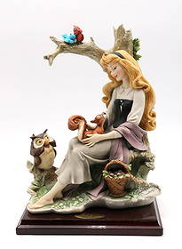 Giuseppe Armani "Sleeping Beauty" for Florence Disney Figurine: Giuseppe Armani (1935–2006) “Sleeping Beauty” for Florence, Italy circa late 20th century Porcelain figurine, signed by the artist along the base near the basket. Acco