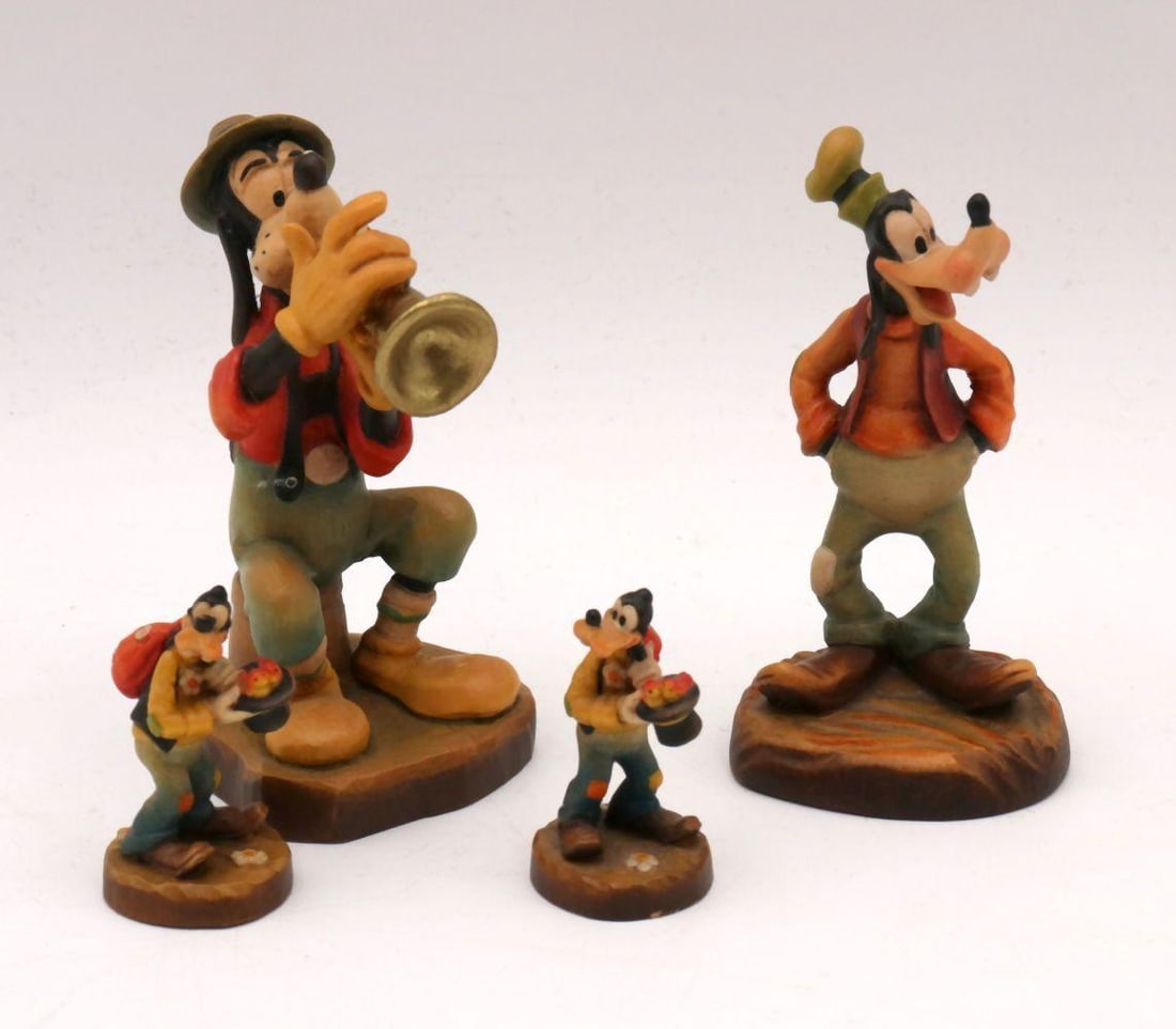 Lot of 4 Anri Wood-Carved Goofy Sculptures: Lot of Four Anri, Goofy, Hand-Painted Woodcarved Sculptures With Original Boxes Boxes approx. 4 x 2 x 2 in.; figurines ranging from approx. 2 x 1 in. to 4 x 3 x 1 ½ in. A set of four hand-