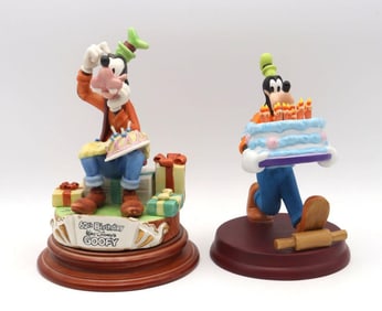 Pair of Lorenz "Goofy Birthday Bash" Ceramic Figurines