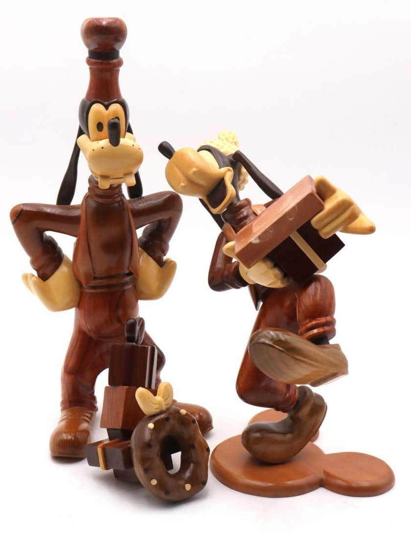 Pair of Disney Collectors "Goofy" Wood Carved Figurines: Pair of Disney Collectors “Goofy” Wood-Carved Figurines Maker: Disney Date: Late 20th Century Dimensions: Ranging from approximately 9 in. H ×