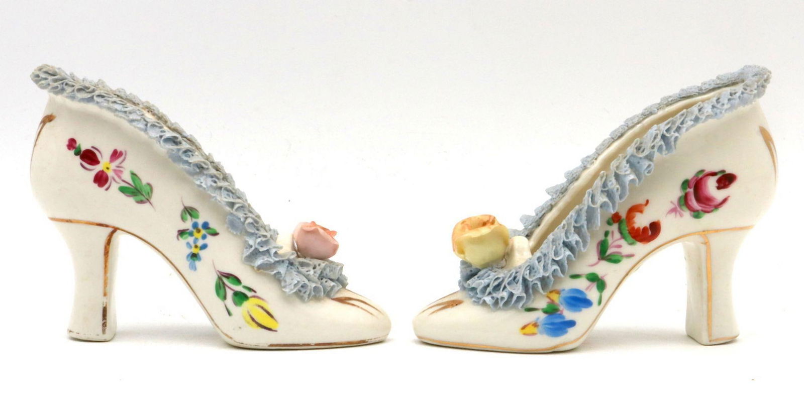 Dresden Porcelain High Heel Porcelain Figurines: PAIR OF DRESDEN PORCELAIN HIGH HEEL FIGURINES Germany, early 20th century Hand-painted porcelain with gilt decoration Each: 3¼ x 4¼ in. (8.3 x 10.8 cm) Signed and marked underside: “Dresden German