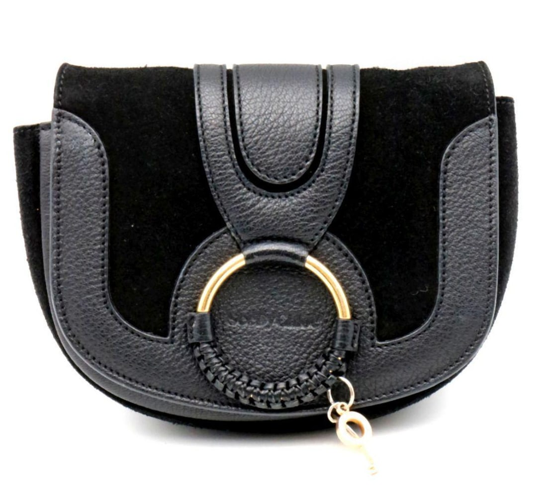 Chloe Hannah "See" Black Leather & Suede Hand Bag: CHLOE HANAH BLACK LEATHER AND SUEDE “SEE” HANDBAG Combining smooth leather with velvety suede, this “See” handbag reflects Chloe Hanah’s refined, contemporary design lang