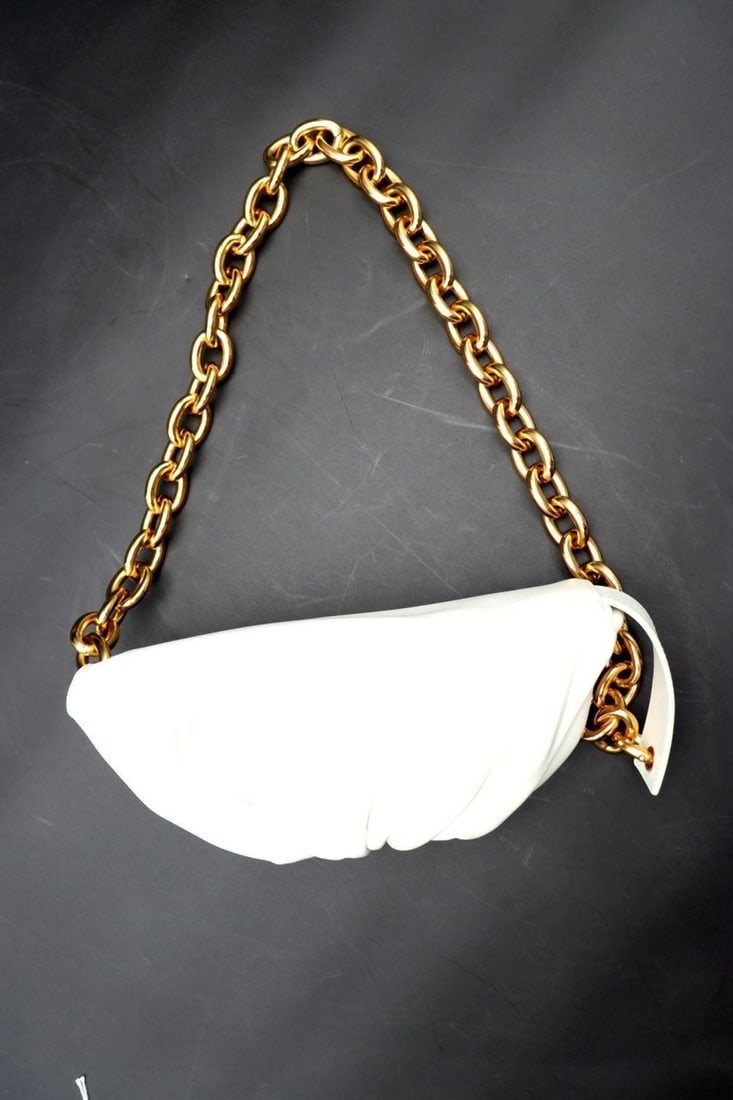 Bottega "Veneta" White Chain Leather Pouch: BOTTEGA VENETA WHITE CHAIN LEATHER POUCH, ITALY A sculptural example of Bottega Veneta’s modern design language, this white leather Chain Pouch features the house’s signature voluminous si