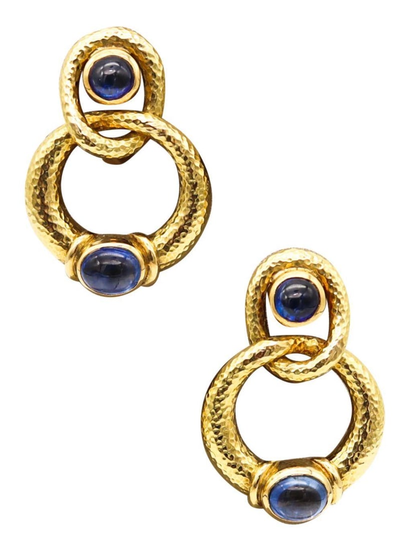 David Webb 18Kt & Sapphire Clip-On Earrings: David Webb (American, 1925–1975) Sapphire Clip-On Earrings circa 1970 Measurements: approximately 36 mm × 25.2 mm (1.42 × 1.0 in.) 18K yellow gold and sapphire earrings. Elegant
