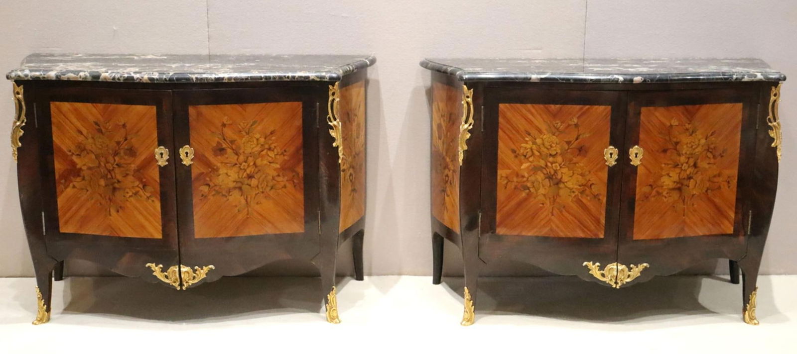 Important Late 18th C. Jacques Dubois Marble Top Commodes: Jacques Dubois (French, 1693–1763) A Pair of Marquetry Commodes 18th century Measurements: 31 in. high × 44 1/2 in. long × 17 1/2 in. deep (each) Marquetry commodes with black