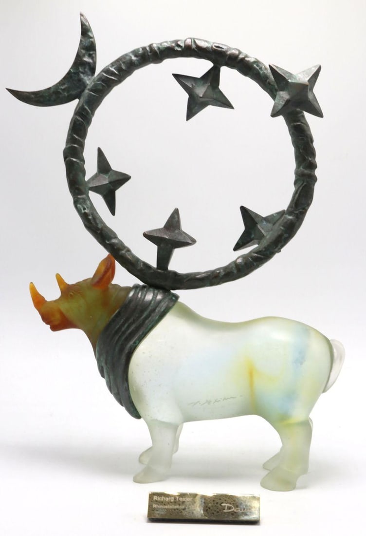 Richard Texier for Daum "Rhinostellation" Crystal & Bronze Sculpture: Daum (French) Rhinostellation Late 20th–early 21st century Measurements: approximately 12 1/2 in. H x 10 in. W Limited edition: 24/150 Pate de Verre/Crystal and bronze Sculptural composition