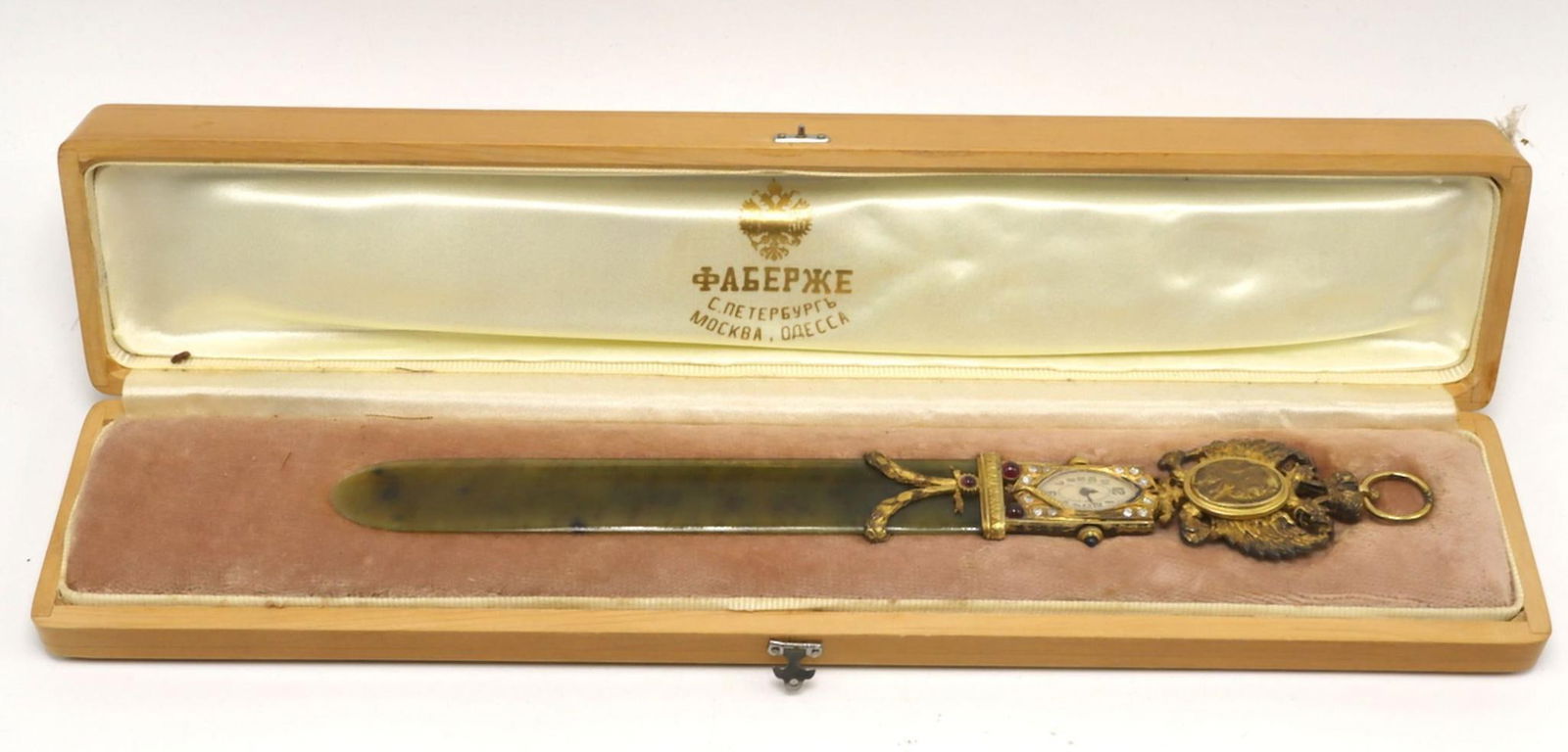 Possibly Henrik Wigström - Fabergé Desk Clock Letter Opener: Henrik Wigström (Finnish, 1862–1923), attributed Possibly Fabergé Nephrite jade, gold-mounted desk clock letter opener Early 20th century Length: 8 inches Formed as a letter