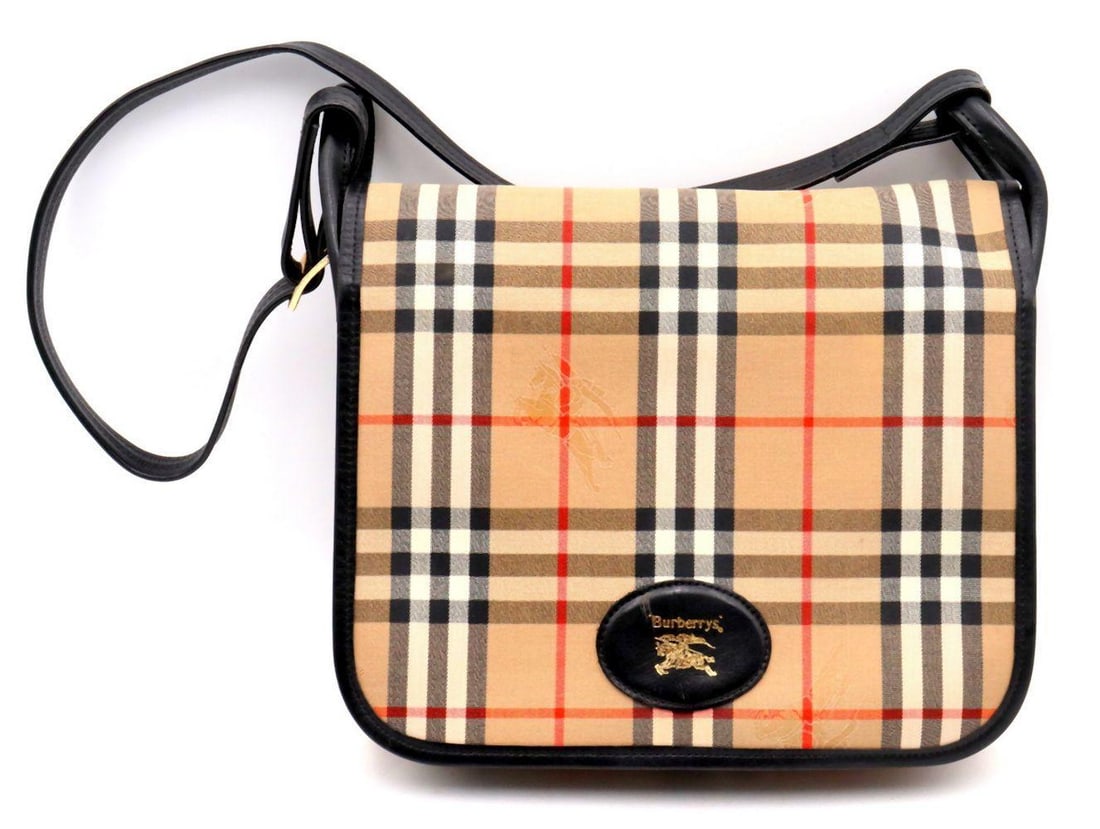 Burberry "Equestrian Knight" Canvas & Leather Crossbody Bag: Burberry Nova Check "Equestrian Knight" Canvas & Leather Crossbody Bag Measurements: 11 1/4" W x 9 1/2" L x 2 1/2" D Canvas and leather crossbody bag by Burberry, featuring the