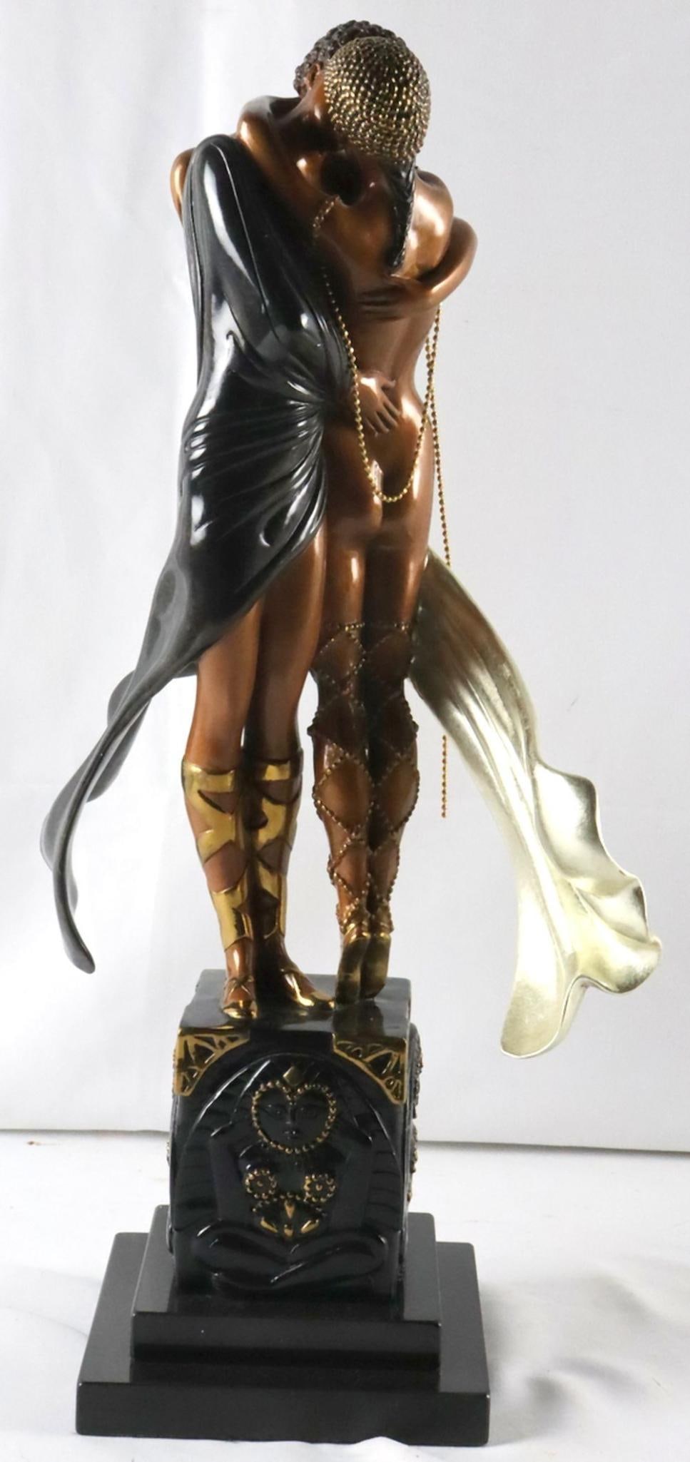 Erte "Lovers and Idol" Cold Painted Bronze Sculpture: Erté (Romain de Tirtoff) (Russian, 1892–1990) Lovers and Idol Measurements: 20 1/2 inches high x 12 1/2 inches wide Cold painted bronze sculpture Limited edition cold painted bronze scul