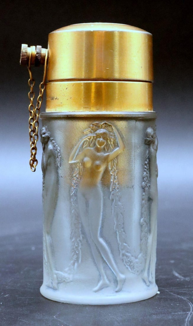 René Lalique “Figurines et Guirlandes” Glass & Bronze Atomizer: René Lalique (French, 1860–1945) “Figurines et Guirlandes” Glass & Bronze Atomizer Model No. 1135 Circa 1920s Measurements: approximately 3 1/2" high x 2" wide