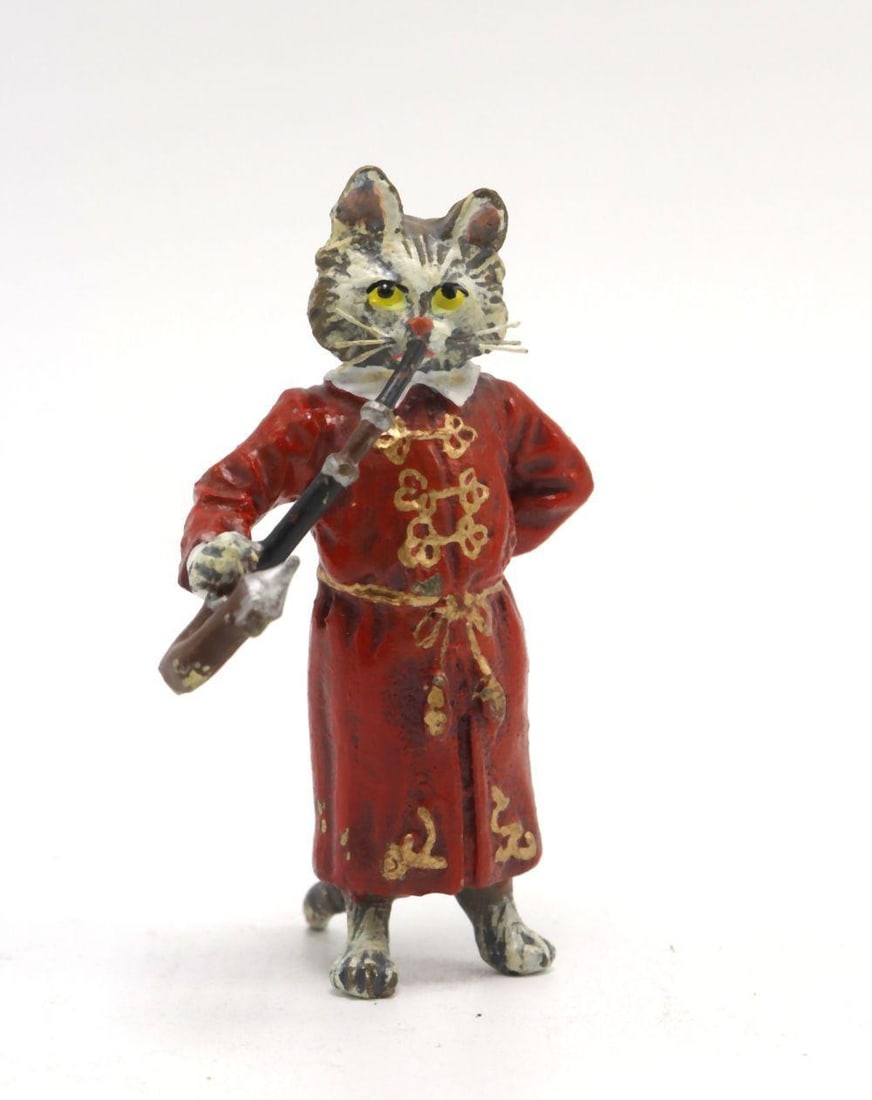 After Franz Bergman "Cat with Smoking Pipe" Bronze Figurine: Franz Xaver Bergmann (Bergman) (Austrian, 1861-1936) Cat with Smoking Pipe, Cold-Painted Bronze Figurine Early 20th century Measurements: 2 in. height x 2 in. width Cast bronze figural sculpture depi