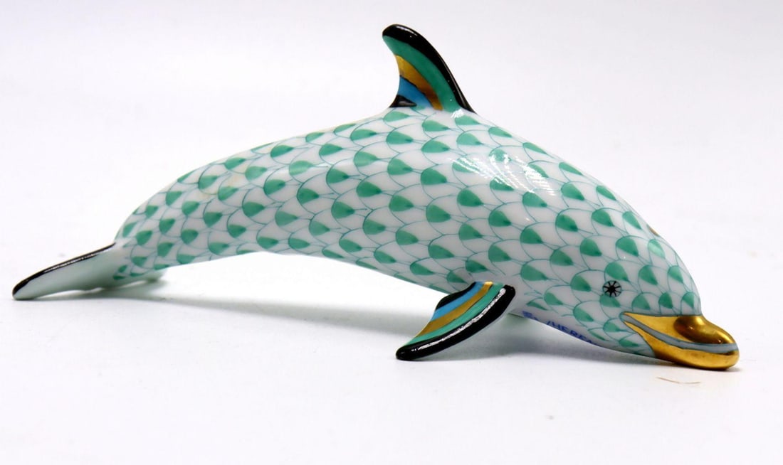 Herend Hand Painted Porcelain Dolphin: Herend Porcelain Manufactory (Hungarian, founded 1826) Dolphin Figurine, 15396 Late 20th Century Measurements: approximately 4 1/4" long x 2" wide Hand-painted porcelain figurine depict