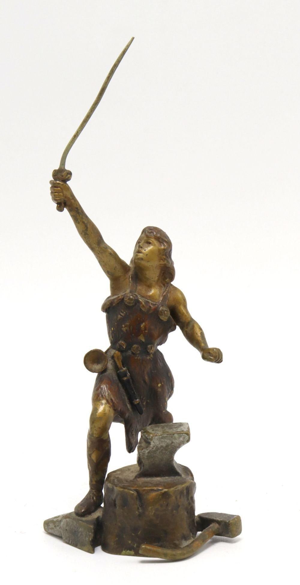 Franz Bergman (Austrian, 1861-1939) Bronze Swordmaker Sculpture: Franz Xaver Bergmann (Bergman), (Austrian, 1861-1939) Bronze Swordmaker Sculpture Late 19th–early 20th century Measurements: 5 in. H × 2 1/4 in. W × 2 in. D Patinated bronze. An