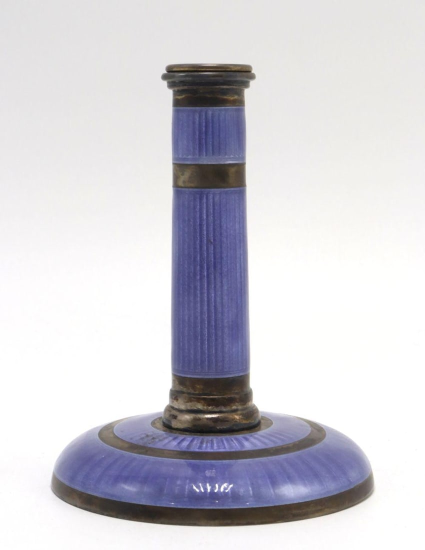 European Guilloché Enamel and Silver Single Candlestick: Continental European Guilloché Enamel and Silver Single Candlestick Early 20th century Measurements: 4 in. H × 2 3/4 in. diameter A Continental European single candlestick with a