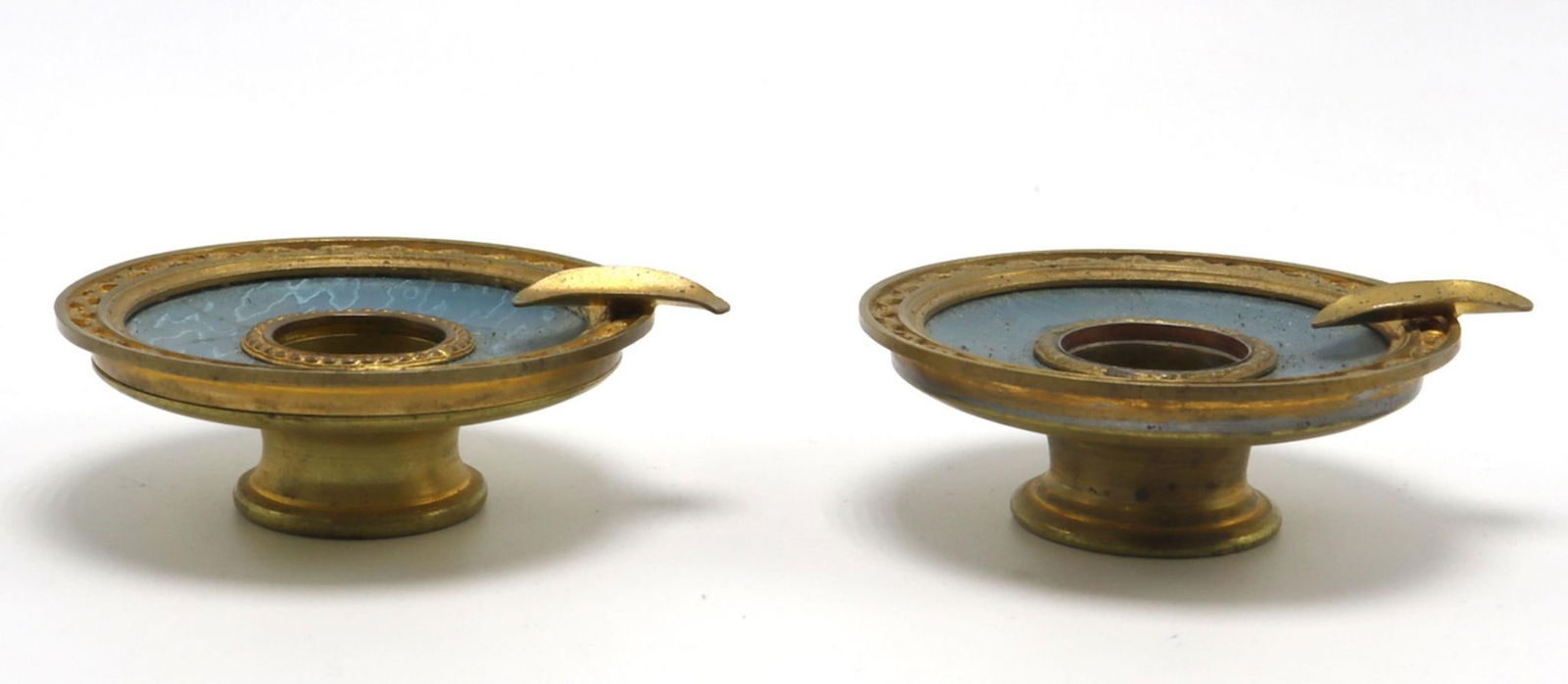French Bronze Enamel Ashtrays: French Bronze Enamel Ashtrays France 20th century Measurements: each approx. 3 1/4 in. diameter A pair of French bronze ashtrays of circular form, each with a central recessed well and a single