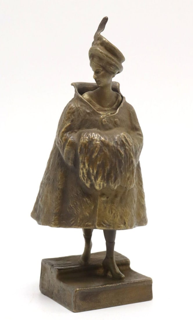 Franz Bergmann Bronze Sculpture of Woman: Franz Xaver Bergmann (Bergman) (Austrian, 1861–1936) Bronze sculpture of a woman with removable coat, early 20th century. Measurements: 4” high x 2” wide. Cast bronze figural sculpt