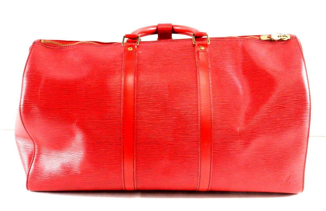 Louis Vuitton Red Leather "Epi 45" Duffel Bag: Louis Vuitton Red Leather "Epi 45" Duffel Bag Measurements: 20" W x 11 1/4" H x 9" D Red Epi leather duffel bag in the “45” style, featuring a structured cylindrical si