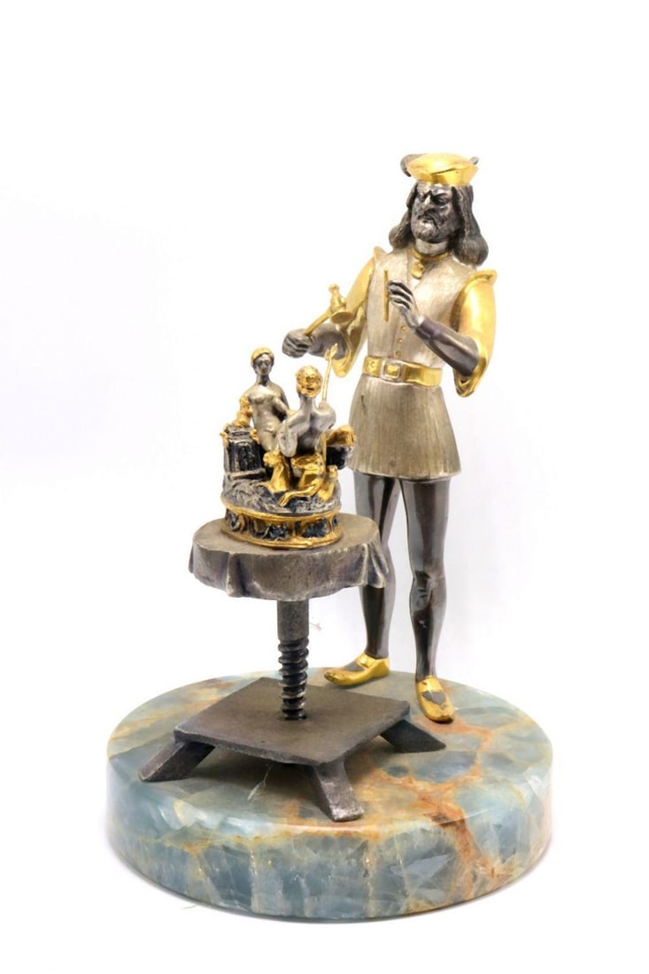 Giuseppe Vasari Ltd. Edition Silvered Bronze Sculpture on Onyx Mount: Giuseppe Vasari (Italian, 1934–2005) Benvenuto Cellini Making the Cellini Salt Cellar Measurements: 9" H x 6" diameter Numbered 43/250 Dated 1993 ​​​​​R