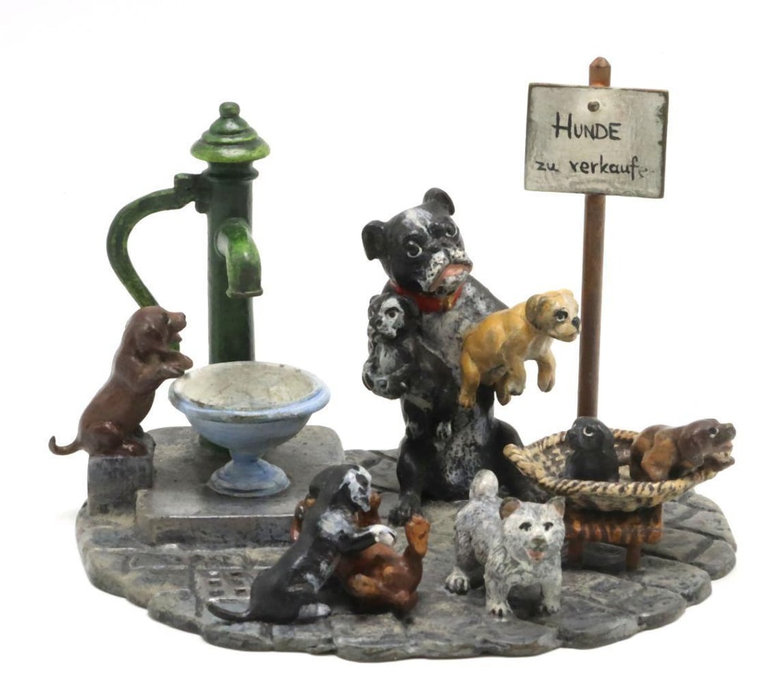 ntique Austrian Cold Painted Bronze Dog Group Sculpture: Antique Austrian Cold Painted Bronze Dog Group Sculpture A finely detailed cold painted bronze figural group depicting a lively street scene populated by dogs in varied poses and activities. The comp
