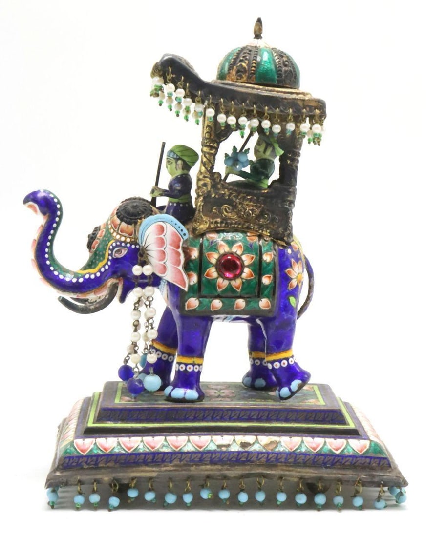 Indian Hand Painted Enamel & Sterling Silver Sculpture: Indian Elephant Sculpture Hand-painted enamel and sterling silver with pearls and turquoise Mid to Late 20th century Measurements 7 1/2 in. high x 5 1/2 in. wide Weight 18.20 troy oz. <