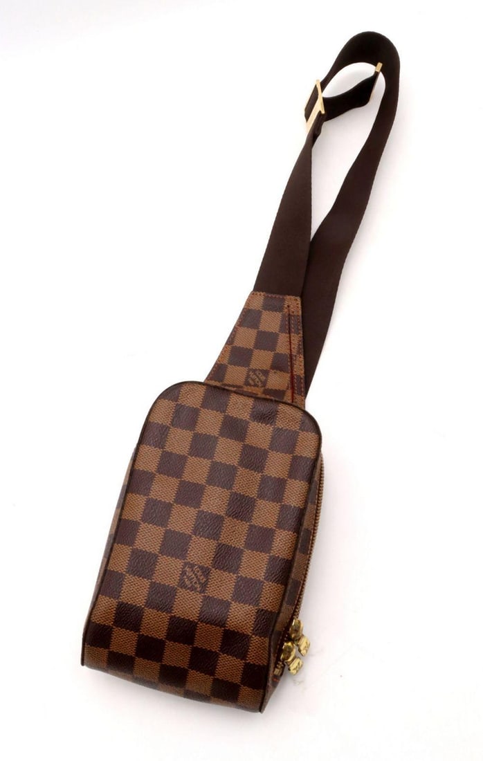 Louis Vuitton Brown Damier Ebene Belt Bag: Louis Vuitton Brown Damier Ebene Belt Bag Measurements: 7 1/2" L x 5 1/4" W x 2" D Brown Damier Ebene coated canvas belt bag, featuring a compact structured form with zip closure and adjus