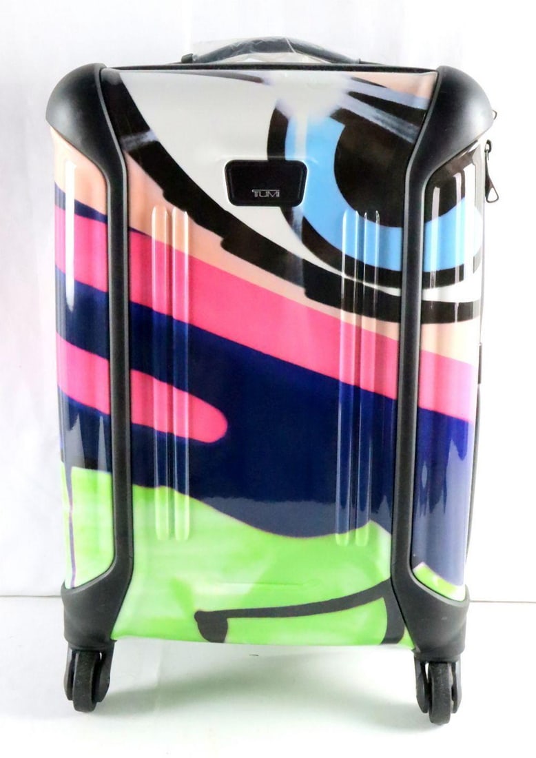 John Matos for Tumi "Vapor Tag" Hard Shell Rolling Suitcase: John “Crash” Matos (American, b. 1961) "Vapor Tag" Limited Edition Hard Shell Rolling Suitcase, for Tumi Measurements: approx. 13 in. W x 21 in. H x 9 in. D A John “Crash