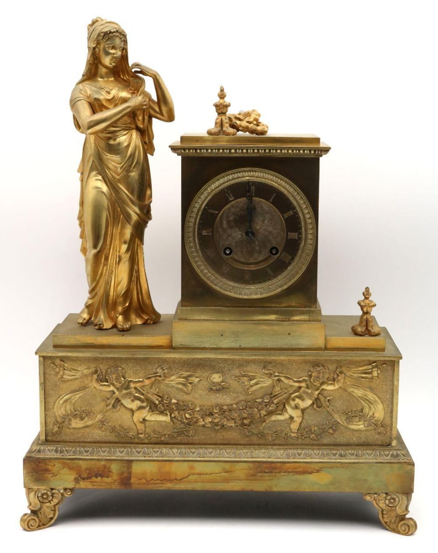 Late 19th C. French Empire Style Bronze Mantel Clock: French Empire Style Gilt Bronze Mantel Clock Late 19th Century 16 1/2" H x 13" W x 5 1/2" D A gilt bronze mantel clock in the French Empire style, featuring a neoclassical composition with