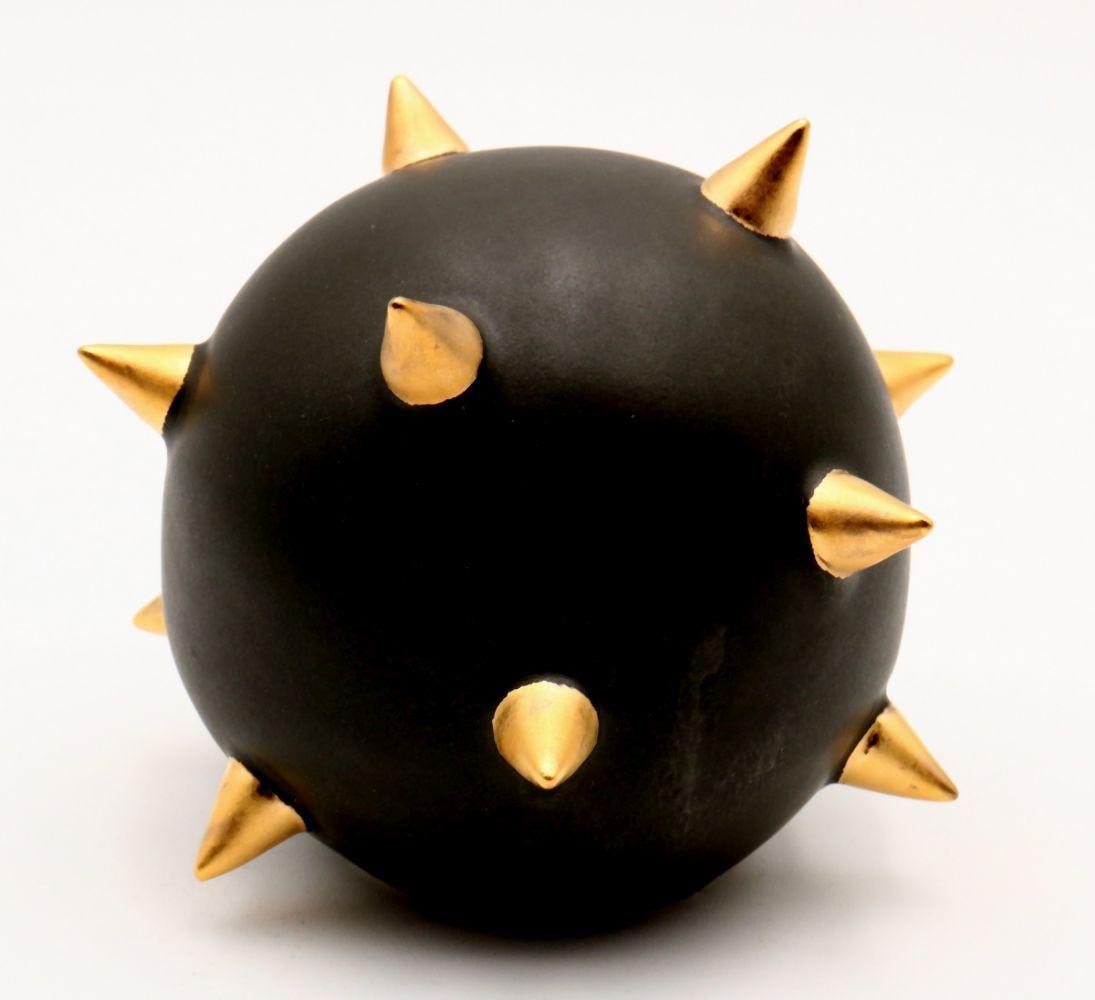 Amanda Wright "Sphere with Gold Spikes" Stoneware Sculpture: Amanda Wright (American, b. 1984) Sphere with Gold Spikes 2016 4" H x 5" W x 5" D Wheel-thrown stoneware sculpture with matte black glaze and overall gold lustre spikes across the