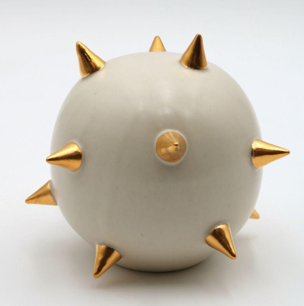 Amanda Wright "Sphere with Gold Spikes" Stoneware Sculpture: Amanda Wright (American, b. 1984) Sphere with Gold Spikes 2016 4" H x 5" W x 5" D Wheel-thrown stoneware sculpture with matte white glaze and overall gold lustre spikes across the