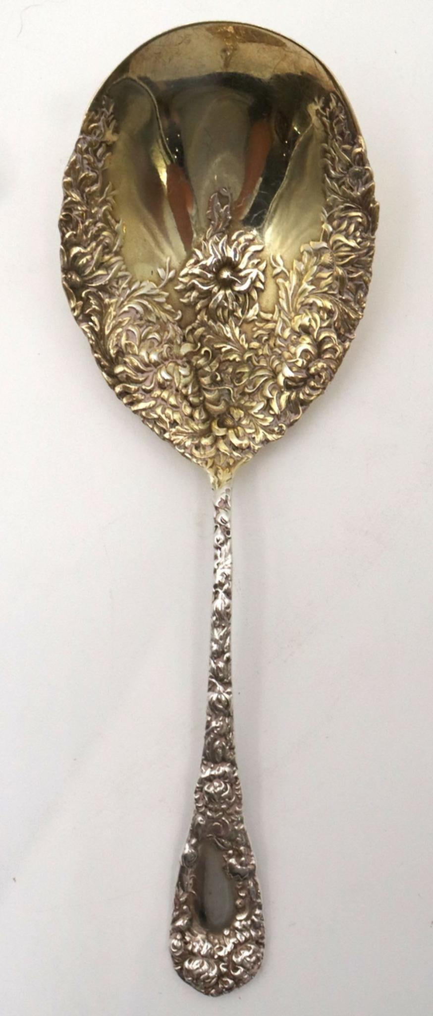 Rare Durgin "Chrysanthemum" Vermeil Sterling Berry Spoon: Durgin “Chrysanthemum” Vermeil Sterling Silver Berry Spoon American 19th Century Measurements: 9 3/8" L A rare Durgin “Chrysanthemum” berry spoon in vermeil (gold wash) ste