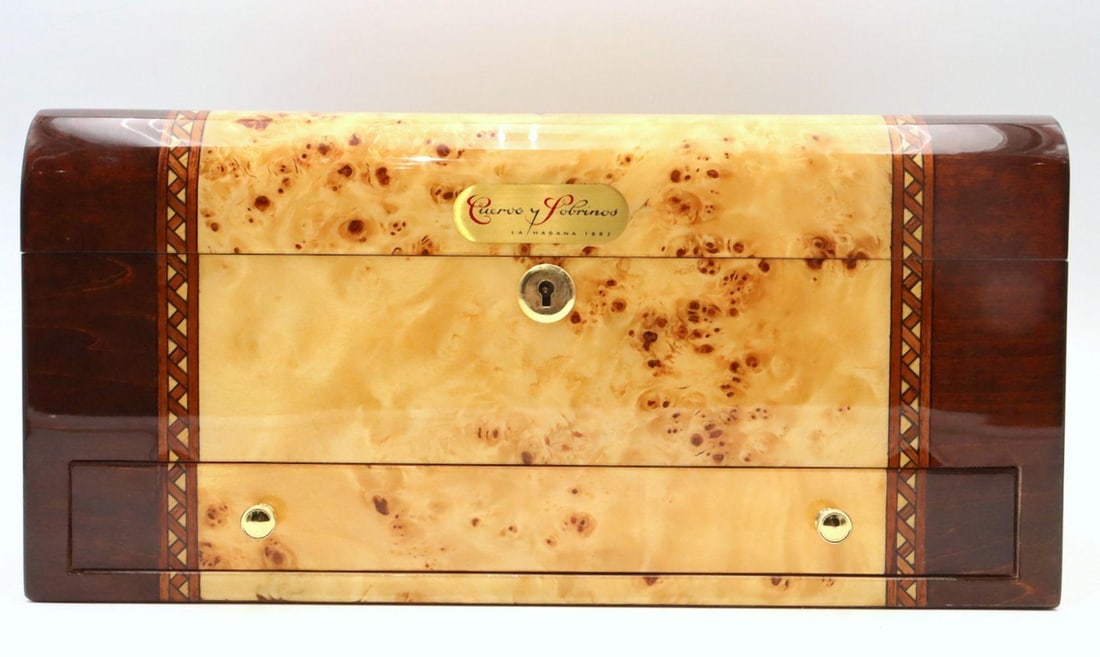 Cuervo y Sobrinos "La Habana 1882" Cigar Humidor: Cuervo y Sobrinos La Habana 1882 Cigar humidor Contemporary 9" D x 14" W x 6 3/4" H Cigar humidor by Cuervo y Sobrinos from the “La Habana 1882” collection, featuring a refined