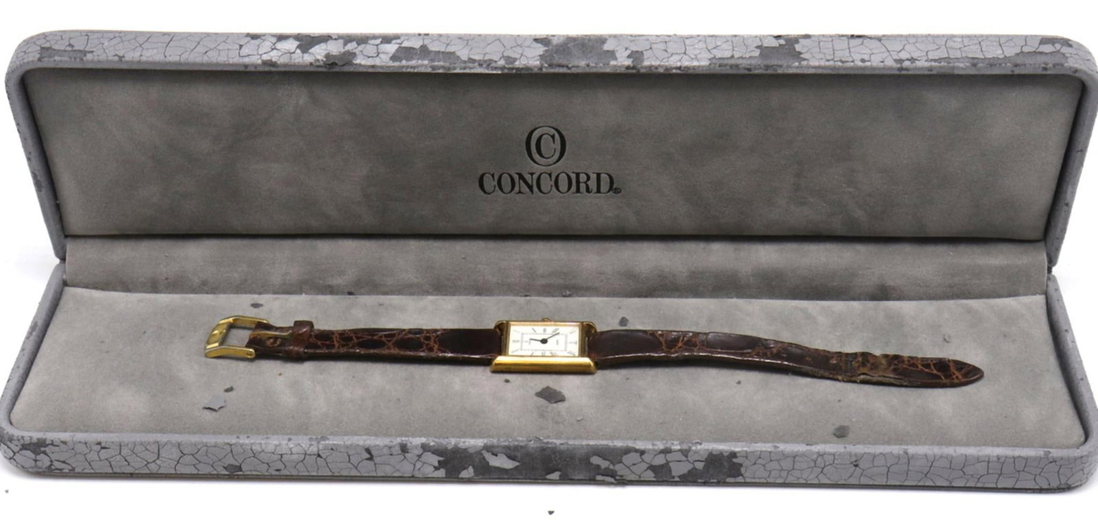Concord 14Kt Quartz Ladies Wristwatch: Concord Ladies Wristwatch 14K gold case, quartz movement, white dial with Roman numerals, cabochon sapphire crown Vintage A refined Concord ladies wristwatch crafted in 14K gold, featuring a white dia