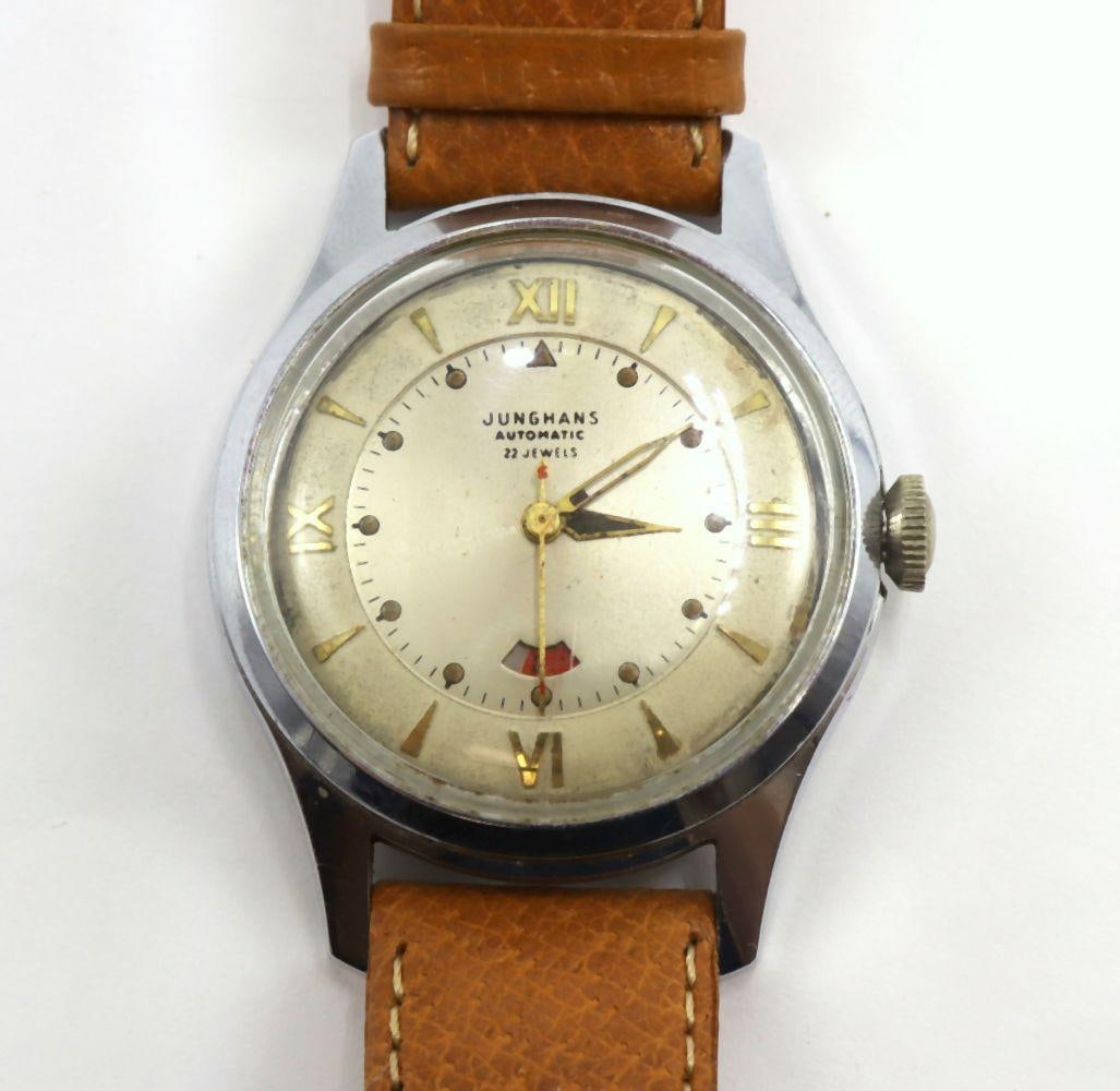 Junghans (German) Automatic Wristwatch: Junghans (German) Automatic Wristwatch Chromed brass case, automatic movement, 22 jewels, power reserve indicator, luminous hands, red seconds hand, German pigskin strap Circa 1952 A vintage Junghans 