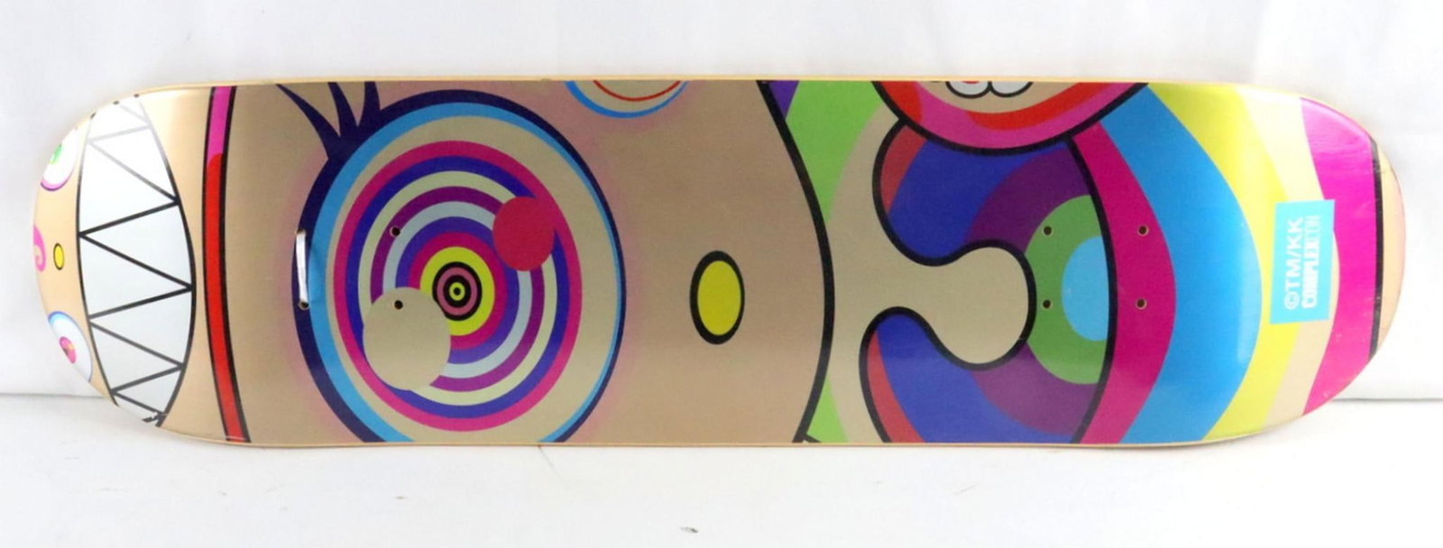 Takashi Murakami "Eyes Mouth Face" Exclusive Skate Deck: Takashi Murakami (Japanese, b. 1962) Eyes Mouth Face Exclusive Skate Deck Measurements: approx. 30 in. W x 8 1/2 in. L A Takashi Murakami “Eyes Mouth Face” exclusive skateboard deck. Murak