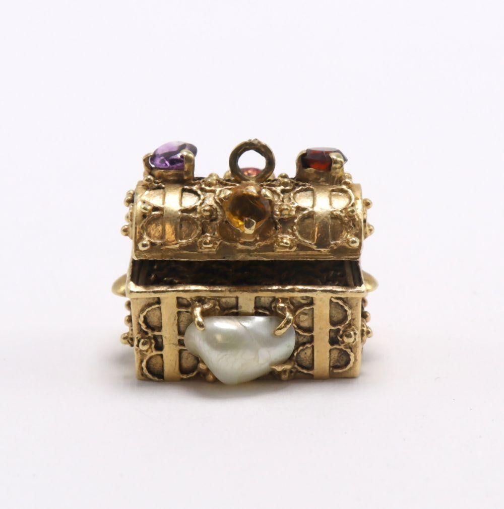 Vintage 14Kt Yellow Gold & Multi-Precious Treasure Chest Charm: Vintage 14Kt Yellow Gold & Multi-Precious Treasure Chest Charm 14Kt Yellow Gold and Multi-Precious Stones Weight: approx. 8.6 dwt A vintage 14Kt yellow gold charm designed as a treasure chest, acc