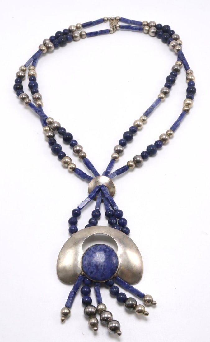 Vintage Southwestern Sterling Silver & Lapis Necklace: Vintage Southwestern Sterling Silver & Lapis Necklace Sterling Silver and Lapis Measurements: approx. 22" long for neck Weight: approx. 4 troy oz A vintage Southwestern sterling silver necklac