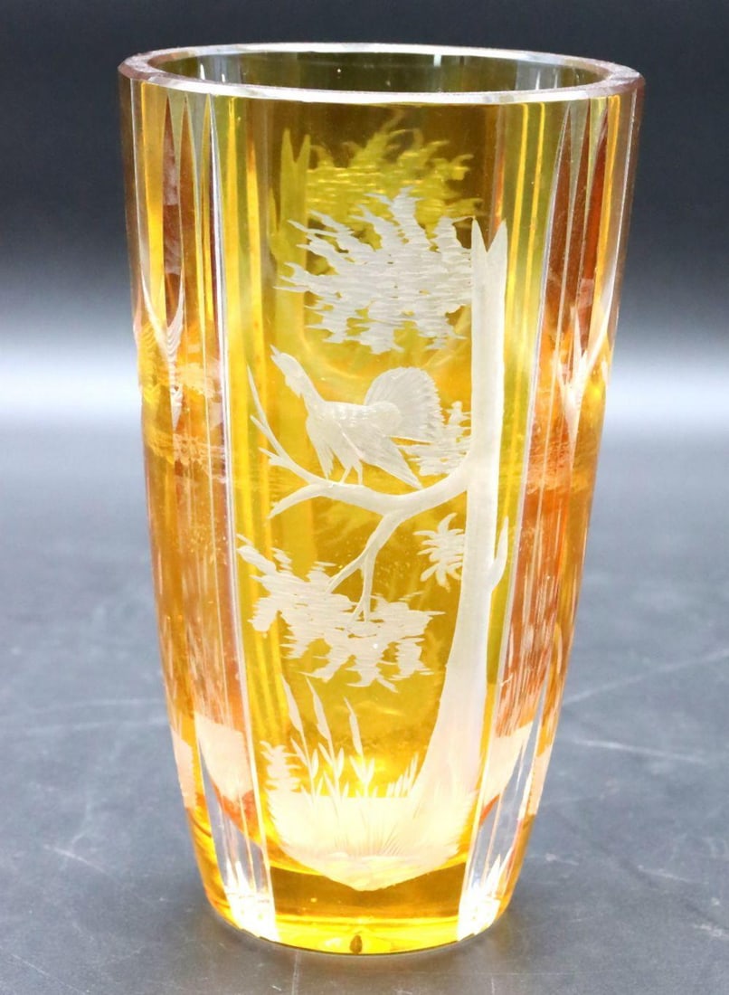 Bohemian Amber Cut Crystal Glass: Bohemian Amber Cut Crystal Glass 20th Century 7 1/4" H x 4 1/4" D A Bohemian amber cut crystal glass, featuring rich amber coloration and intricate cut patterns throughout the body. Overall go