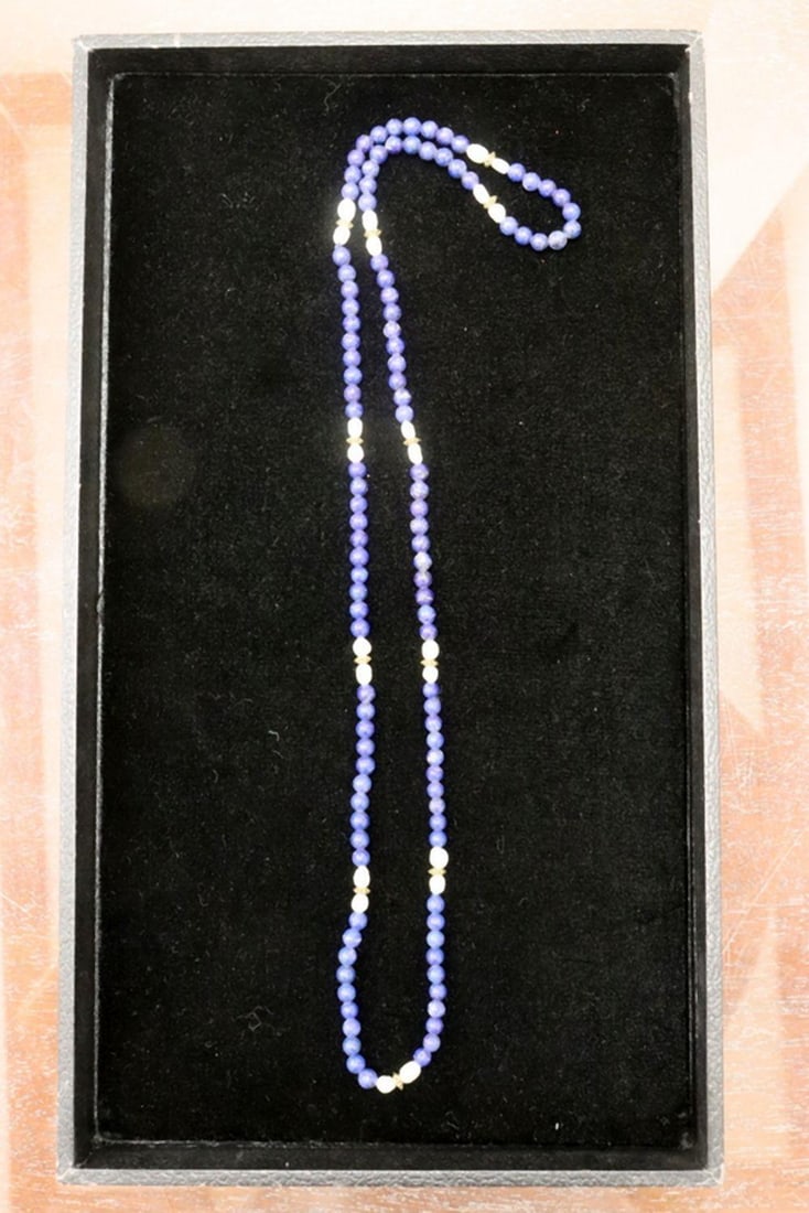 Lapis Lazuli Beaded Necklace: Lapis Lazuli Beaded Necklace 20" L A lapis lazuli beaded necklace composed of deep blue stone beads with natural variation in tone. Condition: Overall good condition. Have a similar item to sell? 