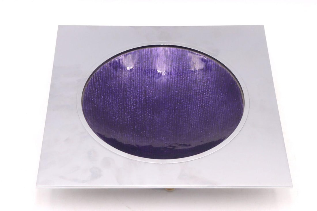 Decorative Enameled Stainless Steel Bowl: Decorative Enameled Stainless Steel Bowl 9" W x 9" D x 1 1/2" H Decorative stainless steel bowl featuring an enameled finish with abstract coloration and shallow rounded form. Condition is