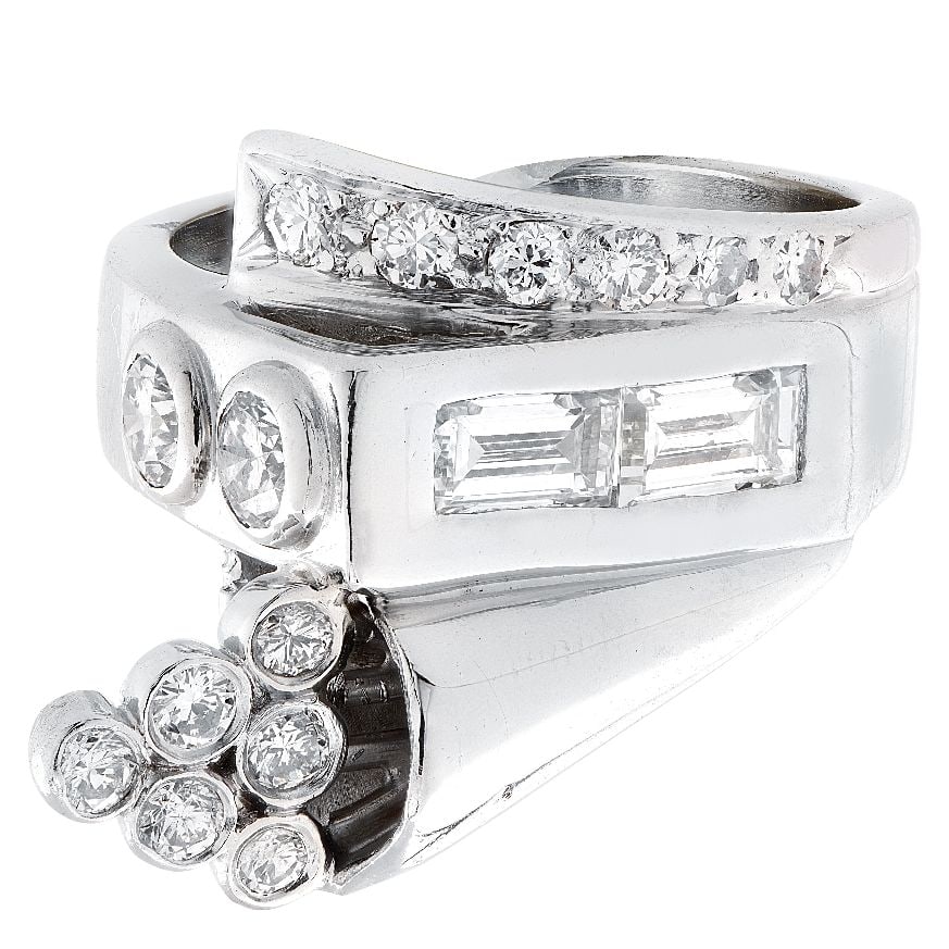 Retro 1 Carat Diamond Cornucopia Cocktail Ring: Retro 1 Carat Diamond Cornucopia Cocktail Ring Artfully crafted in platinum circa the 1950s, this captivating ring takes the graceful form of a cornucopia, its sculptural design evoking abundance and 