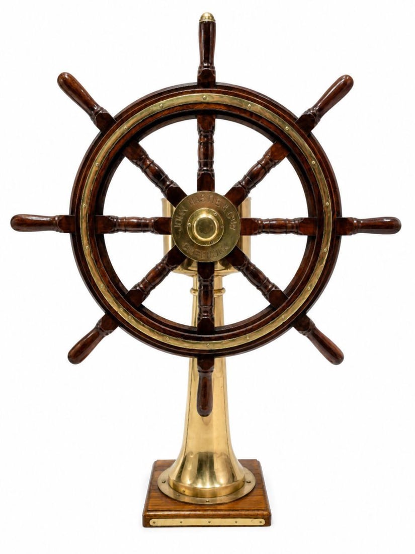 Vintage Lietz Co. Ship's Steering Wheel from the S.S. Iberia: A. Lietz Co. (American), San Francisco, California “Standard Compass” Brass and Glass 61" H x 34" W x 19" D Vintage compass bearing a metal plaque with the A. Lietz Co. name