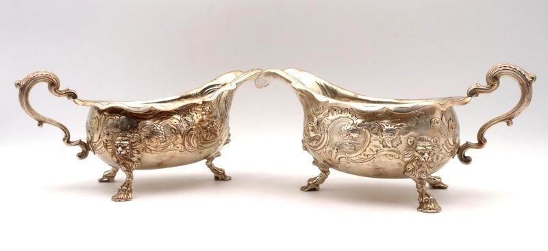 19th C. Silver Plated Holloware Gravy Boats, Group of 2: Unmarked Gravy Boats, Group of 2 Silver-plated holloware, impressed markings Each: 4.75" H x 10" W x 4.75" D Condition: Good condition with light tarnish to each. Have a similar item to
