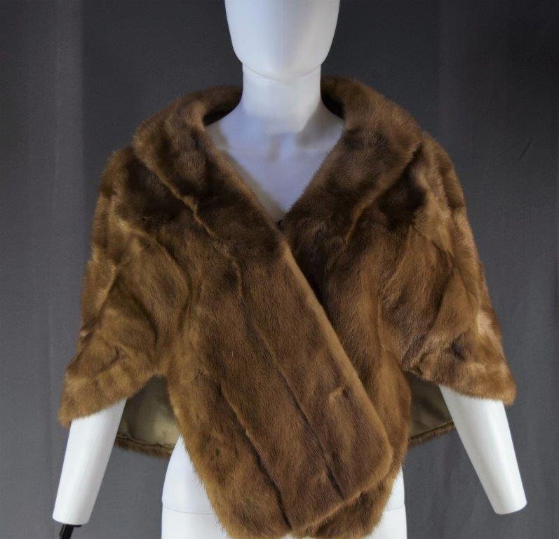 Brown & White Ladies Fur Vest: A vintage brown and white ladies fur vest (shoulder to shoulder 16 1/2")