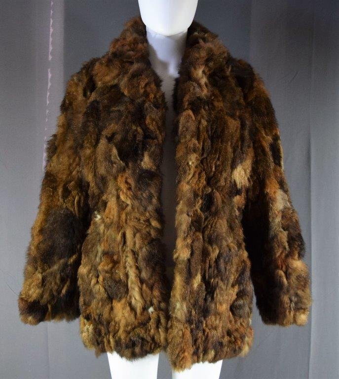 Brown Ladies Fur Coat: A vintage brown ladies fur vest (shoulder to shoulder 17")