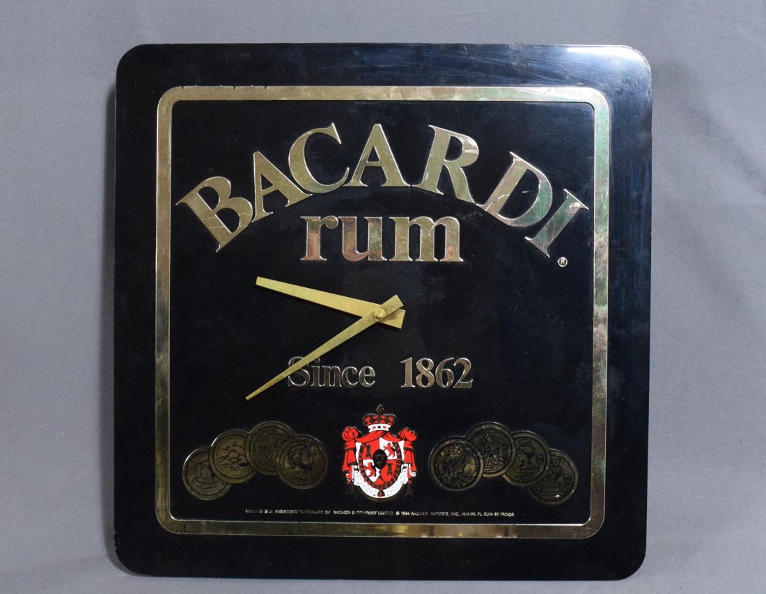 Bacardi Rum Advertisement Clock: BACARDI 20TH CENTURY Battery operated clock used for the advertisement of rum (17" x 15")