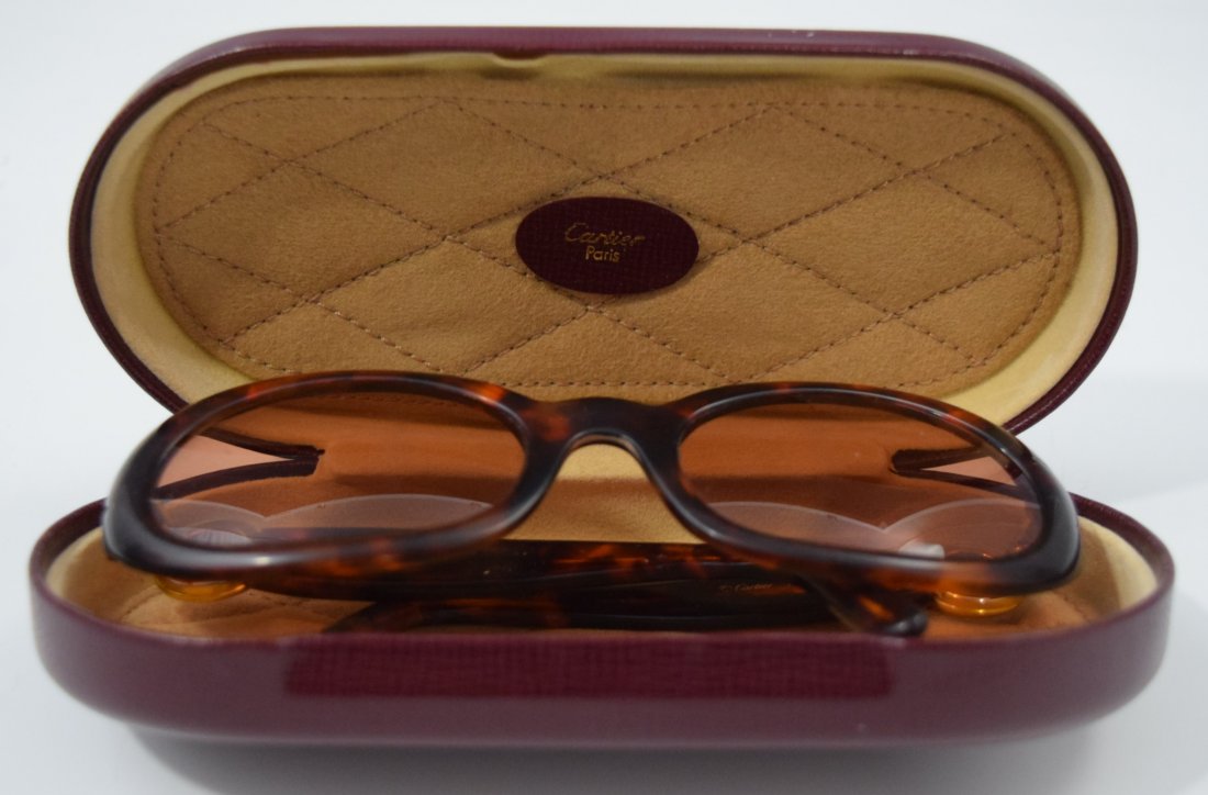 Cartier Sunglasses: CARTIER (FRENCH) Sunglasses issued by Cartier