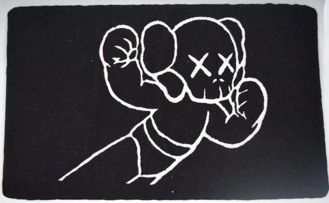 Kaws, Art Rug (38" x 24"): KAWS (21ST CENTURY) Wool, art rug of a figure by Kaws 38" x 24"
