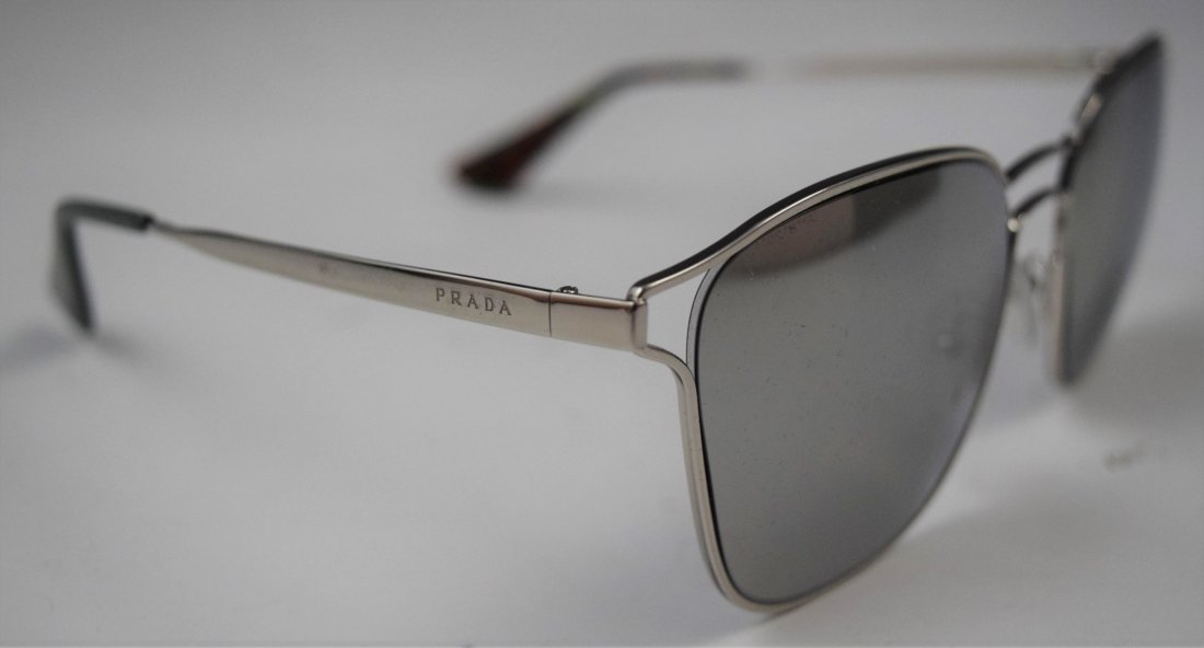 Prada Sunglasses: PRADA (ITALIAN) Sunglasses issued by Prada