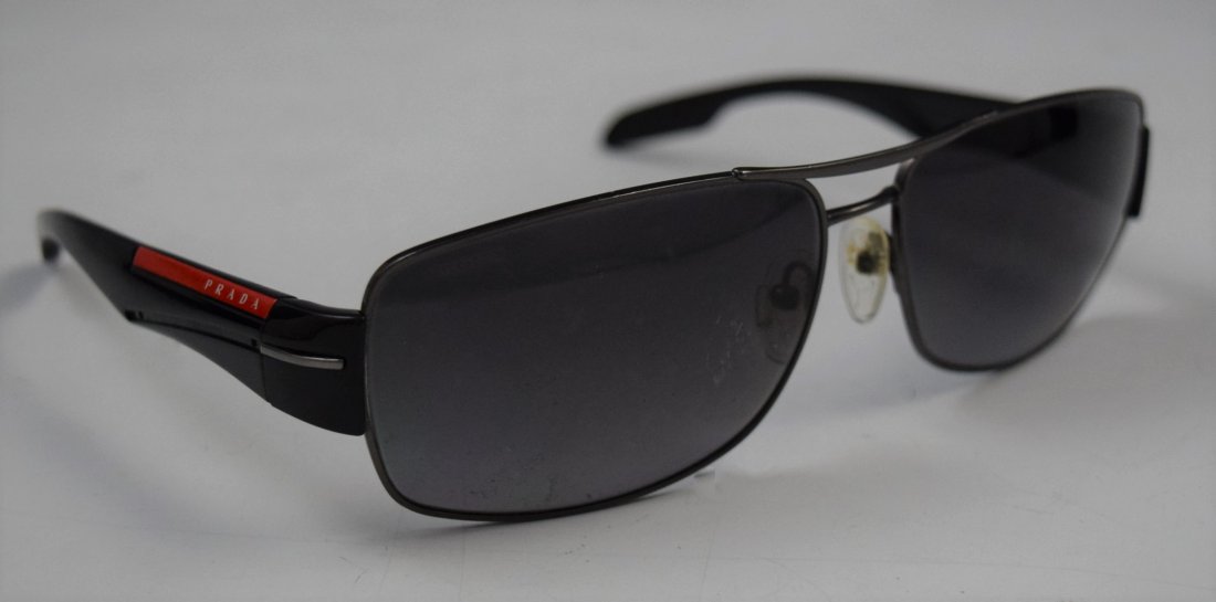 Prada Sunglasses: PRADA (ITALIAN) Sunglasses, issued by Prada