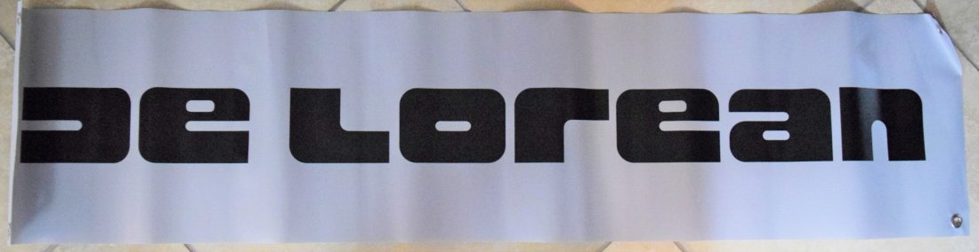DeLorean Automobile Sign: DELOREAN (AMERICAN) Automobile, car advertisement sign for DeLorean 30" x 12"